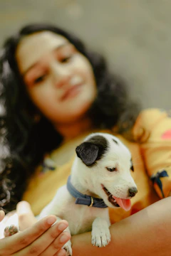 A family warmly welcoming a newly adopted puppy into their home.