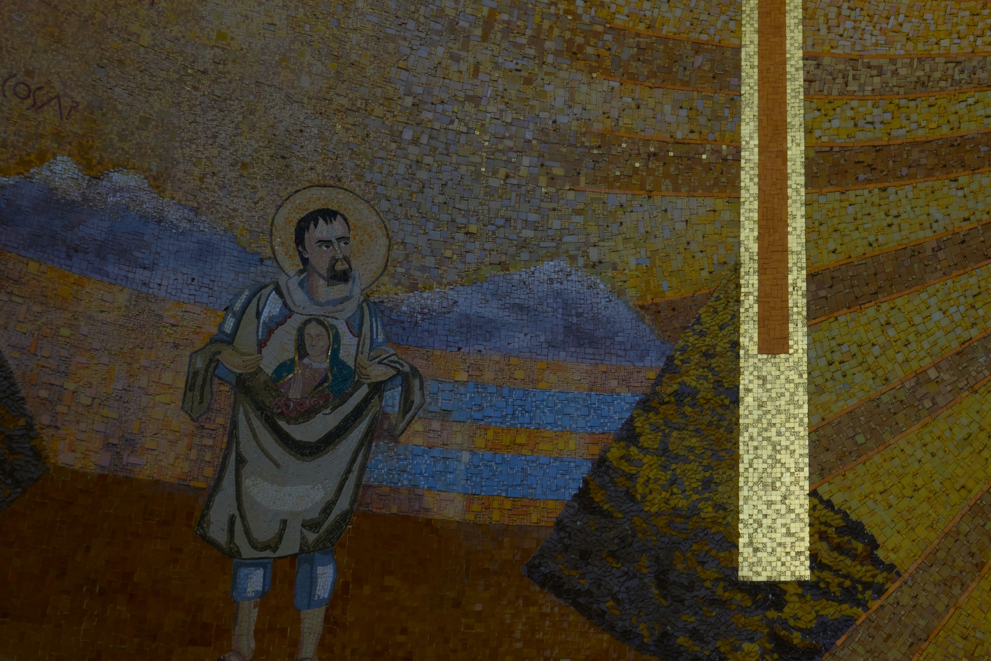 a mosaic of a man holding a child