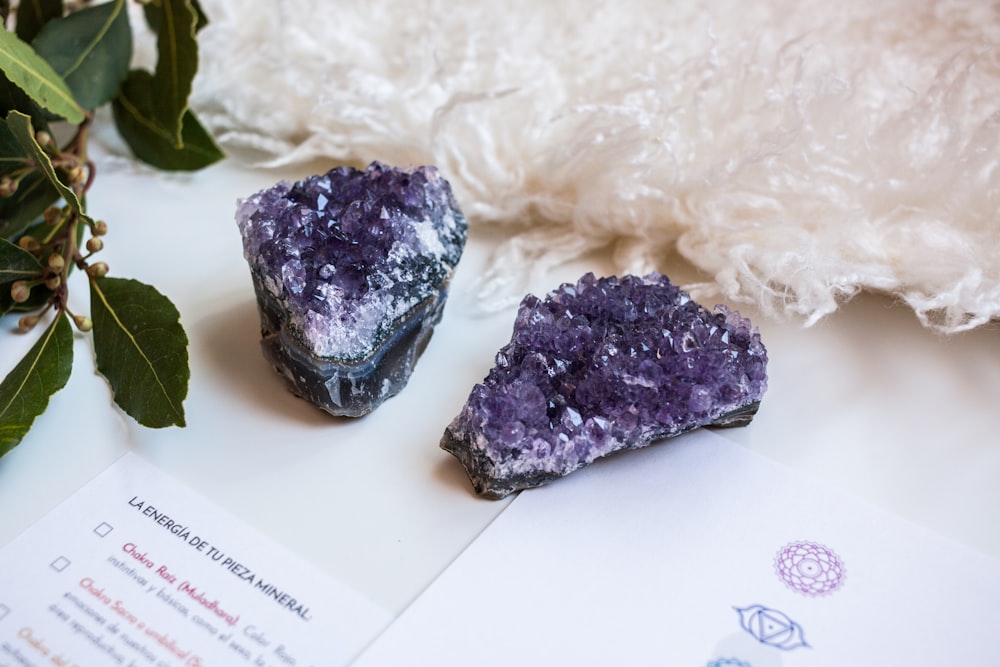 a couple of rocks sitting on top of a table