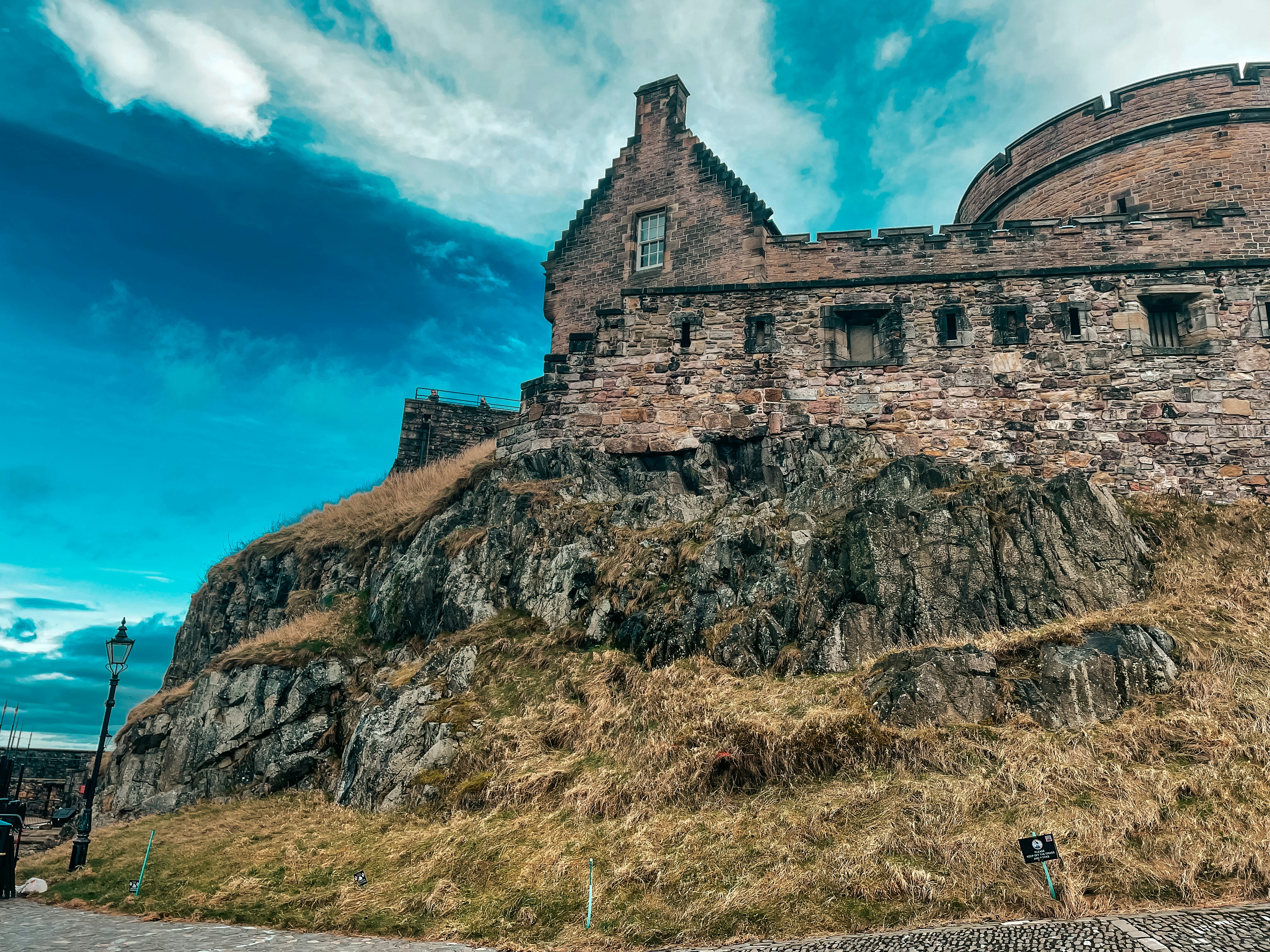 a large stone castle sitting on top of a hill, Edinburgh castle 