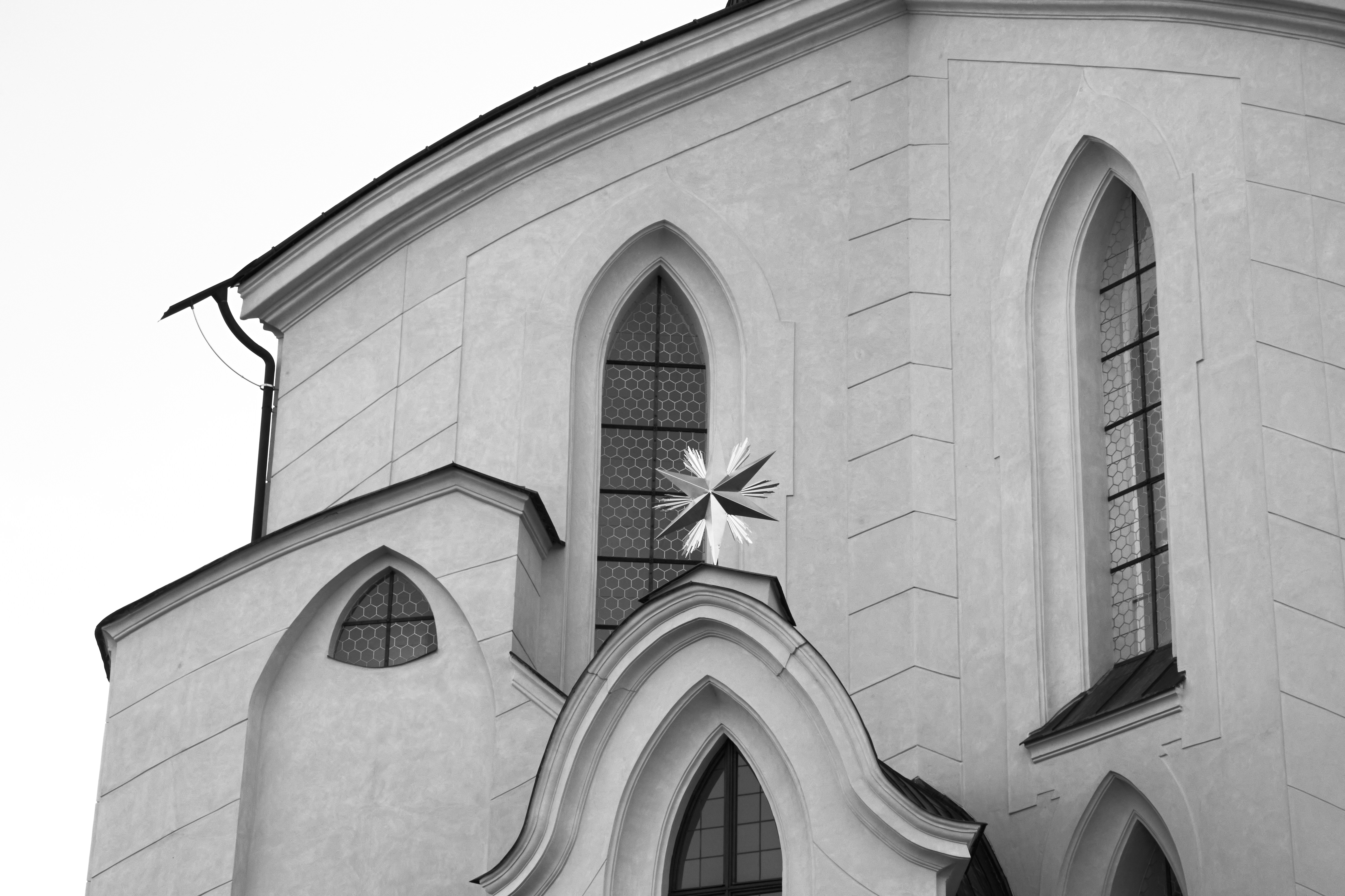 a black and white photo of a church