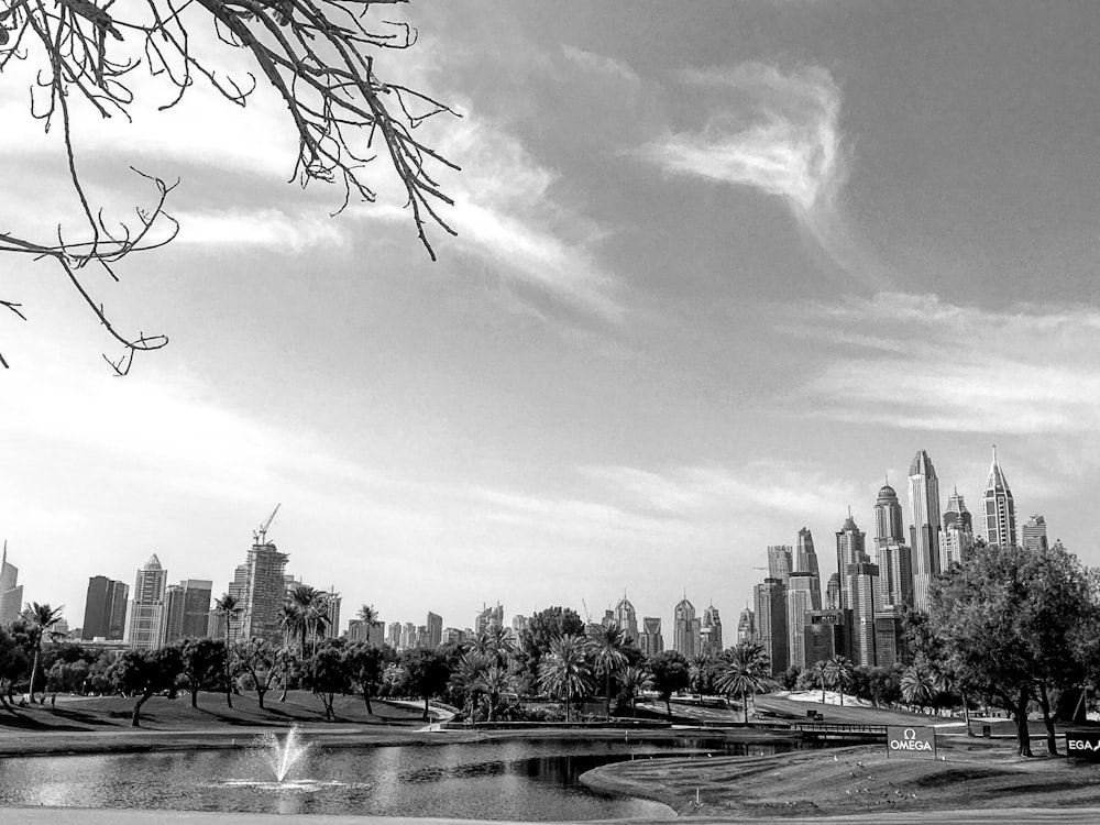a black and white photo of a city park