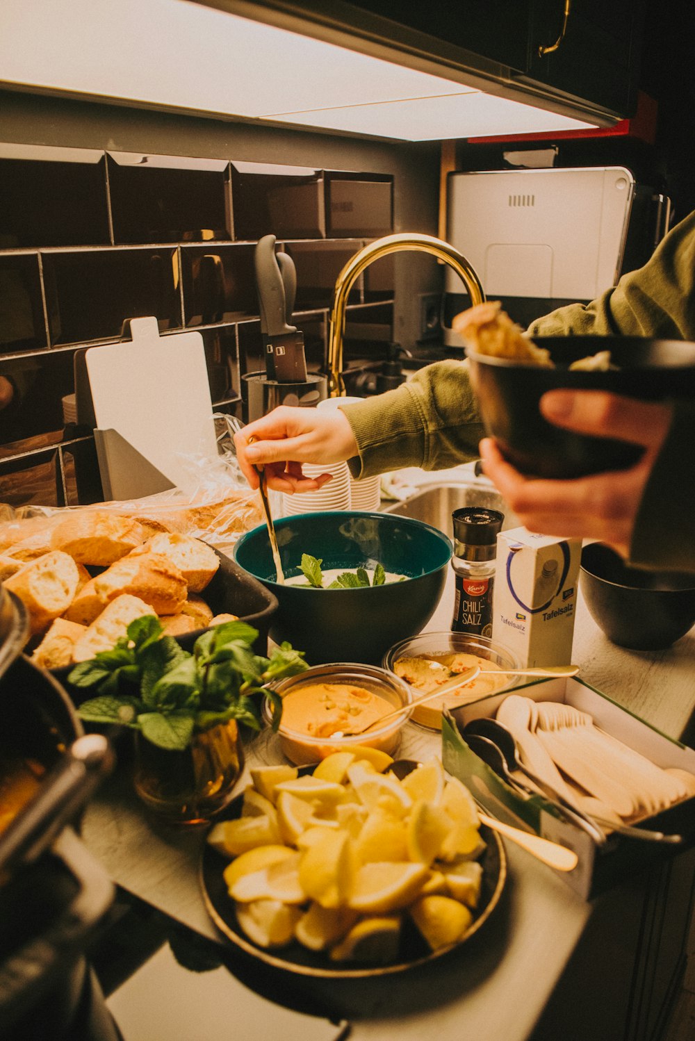 a person is preparing food on a kitchen counter