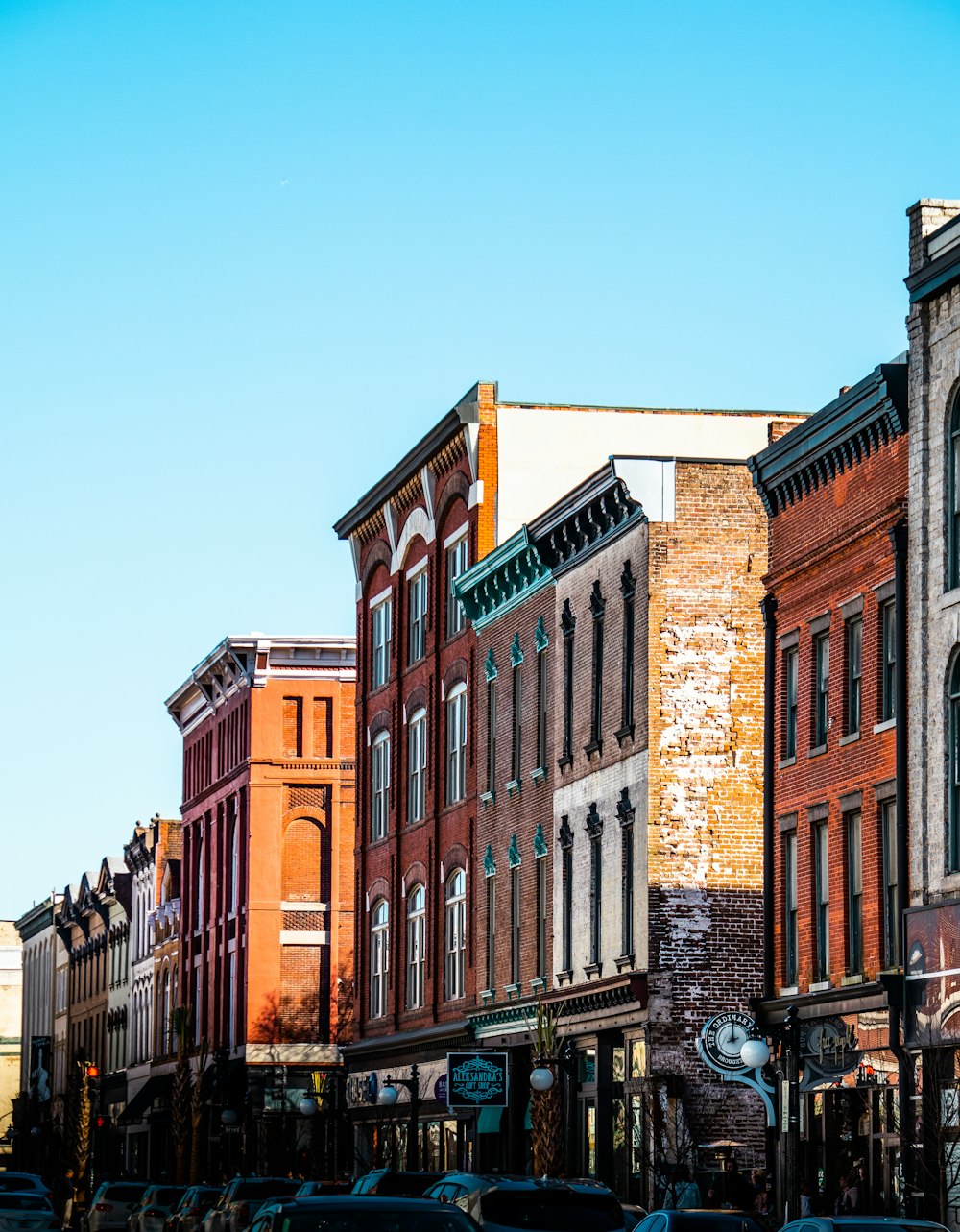 a row of buildings on a city street