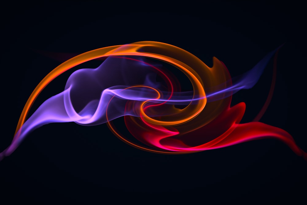 a colorful swirl of smoke on a black background