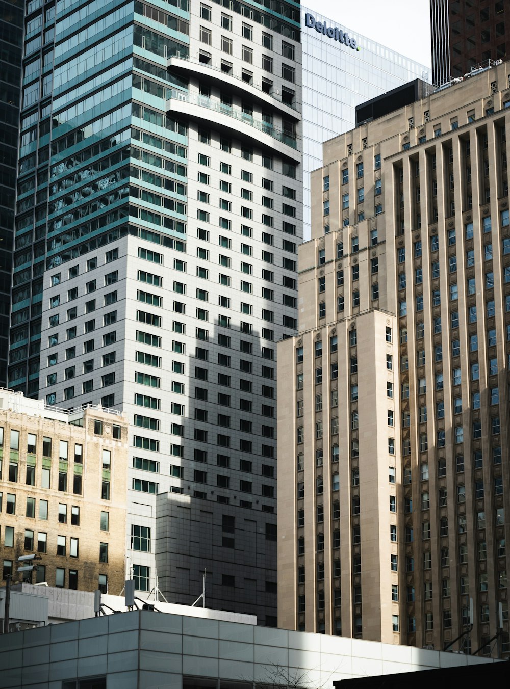 a group of tall buildings in a city