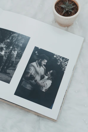 A beautifully designed wedding album spread showcasing elegant typography and vibrant photos.