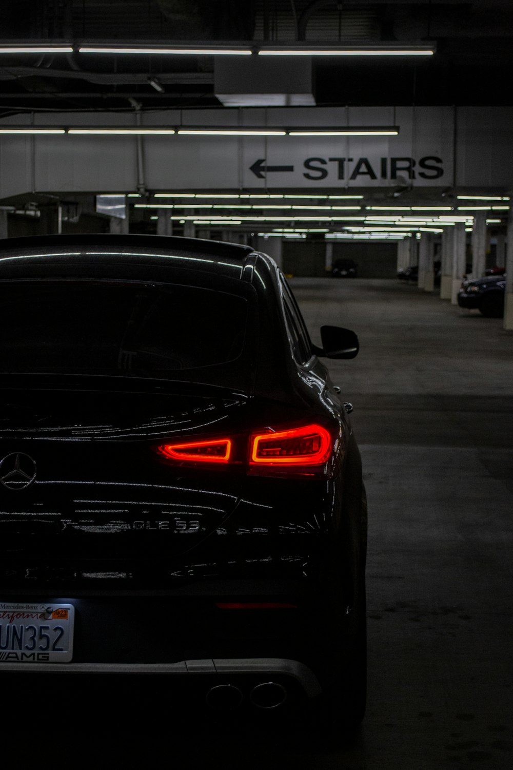 a car is parked in a parking garage