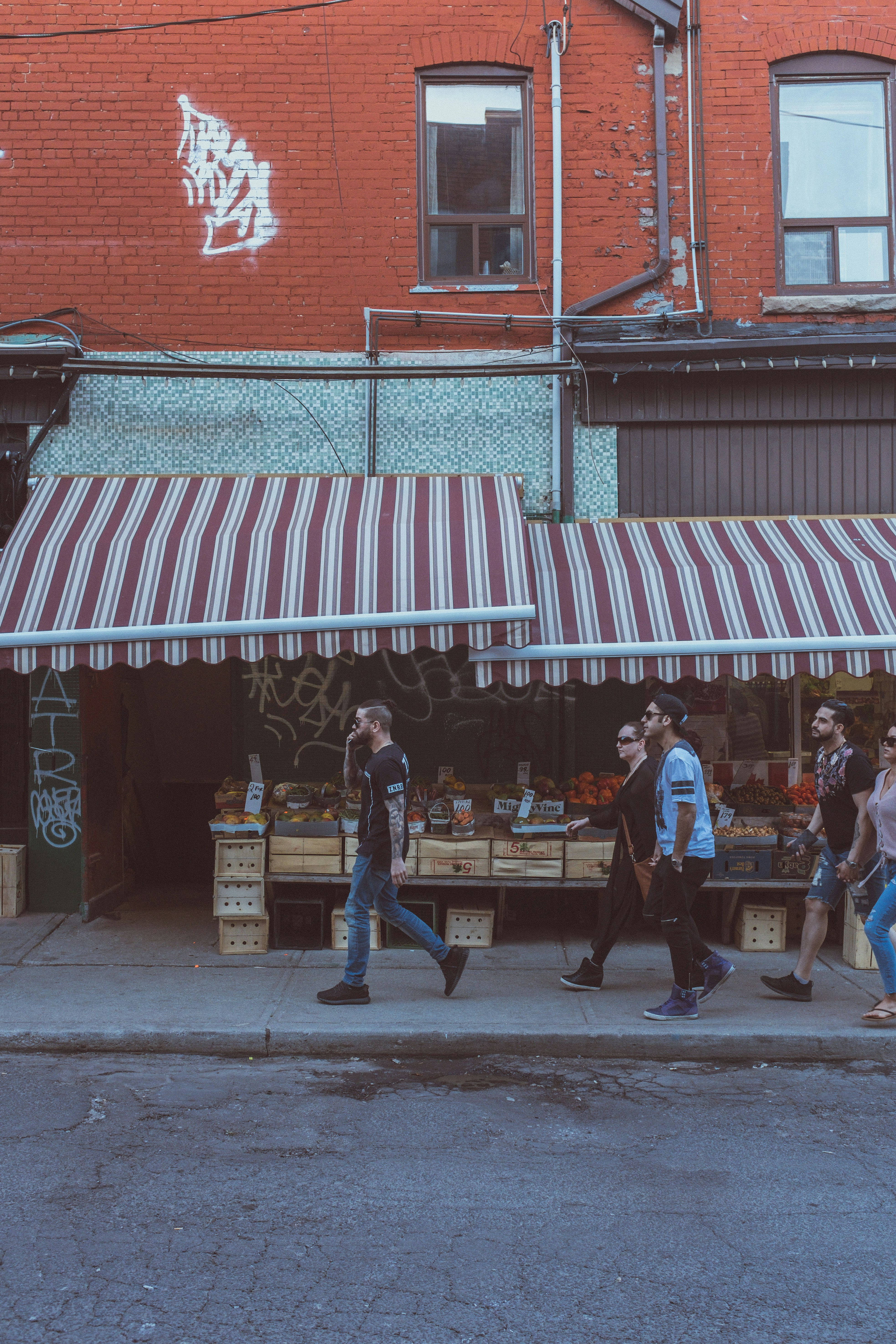 woman wearing yellow long-sleeved dress under white clouds and blue sky during daytime