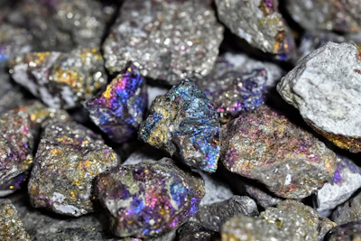 a pile of colorful rocks sitting next to each other