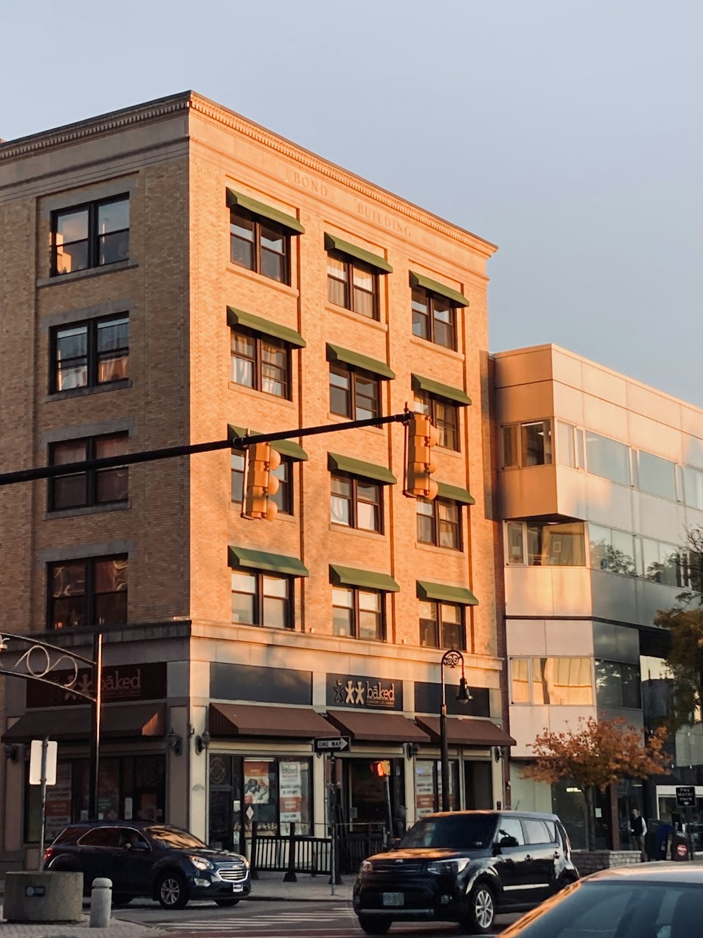 a tall building sitting on the corner of a street