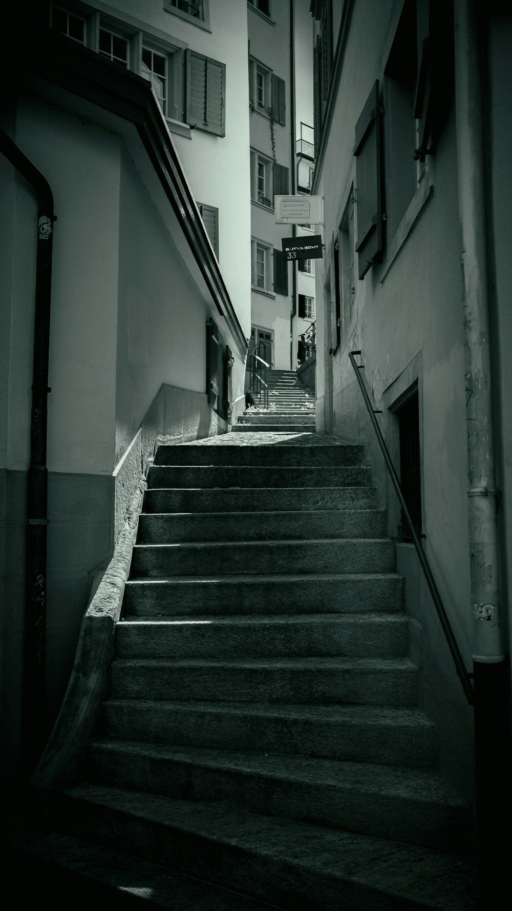 a black and white photo of some stairs