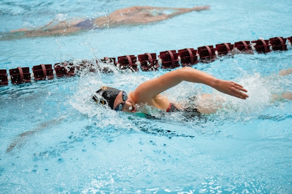 Iowa State Swimmer swims in a  freestyle race.by Jacob Rice