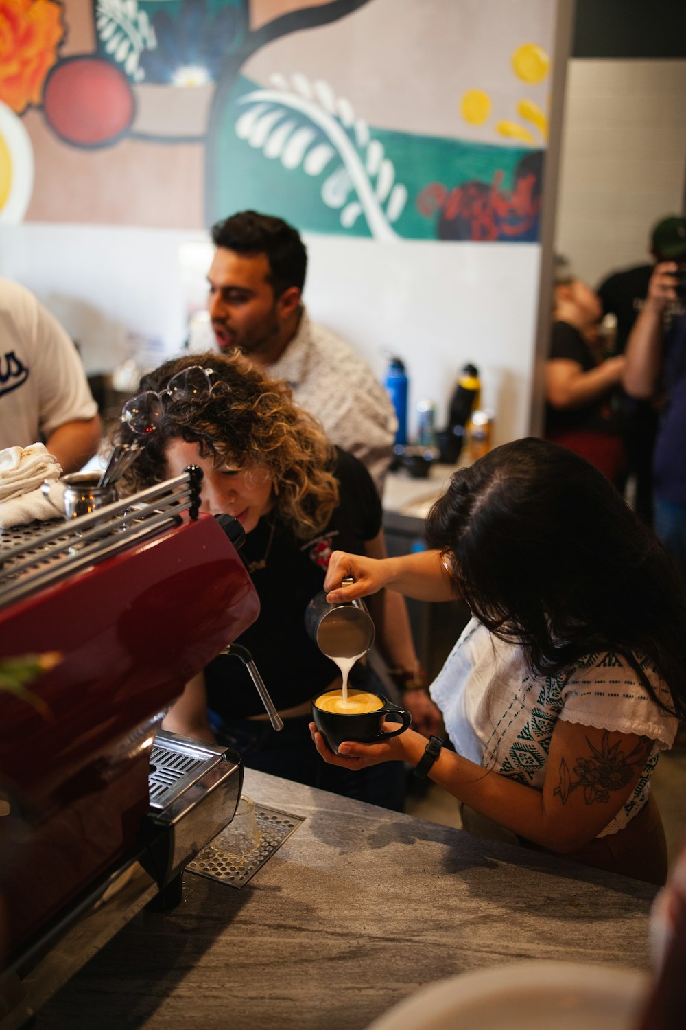 a group of people at a coffee shop