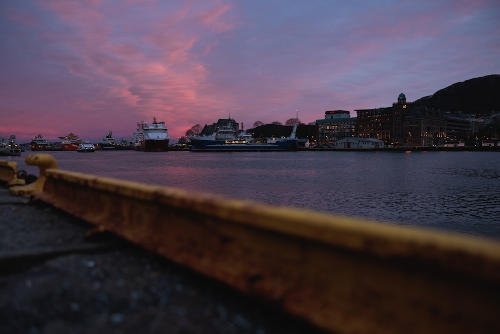 a body of water with a boat in the background