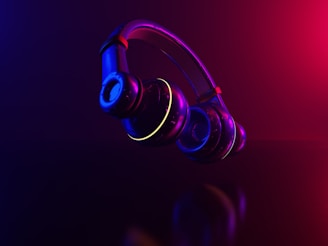 Vibrant image of wireless headphones with neon blue glow and glassmorphism effect