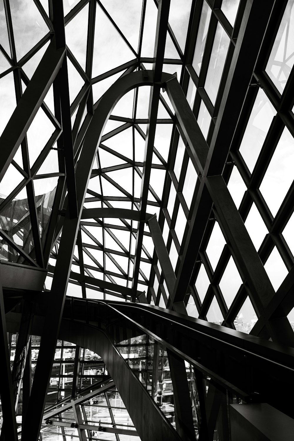 a black and white photo of a metal structure