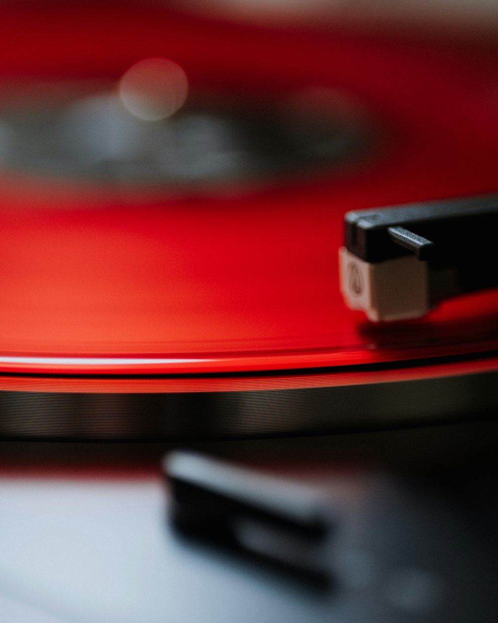 a close up of a red record player