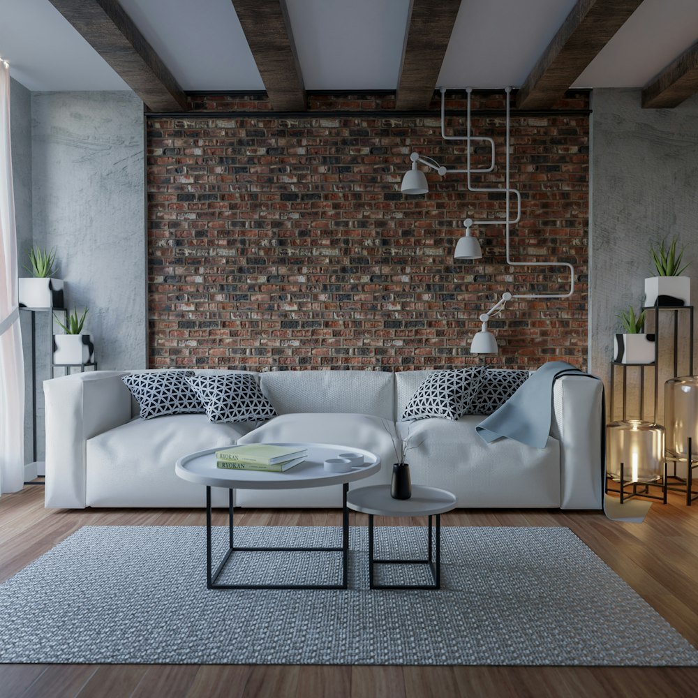 a modern living room with a brick wall