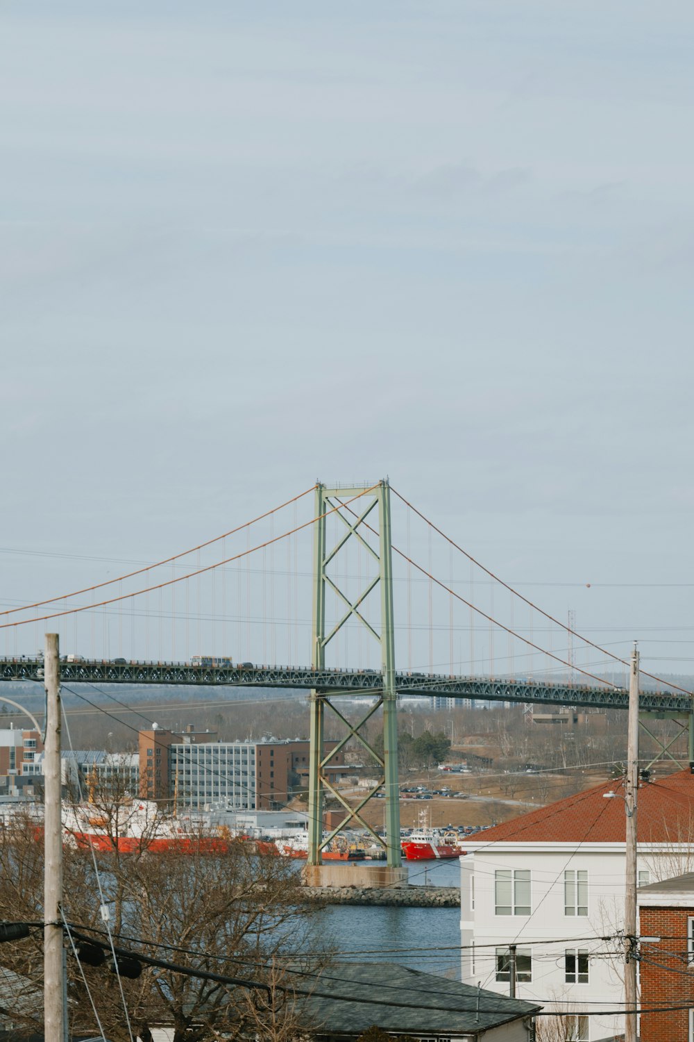 a view of a bridge over a body of water