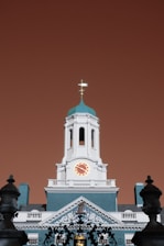 a large building with a clock on the top of it