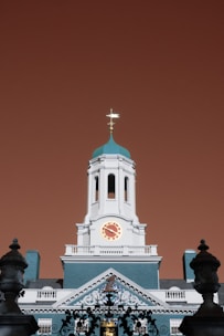 a large building with a clock on the top of it