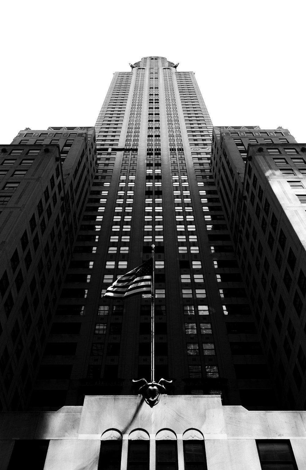 a black and white photo of a tall building