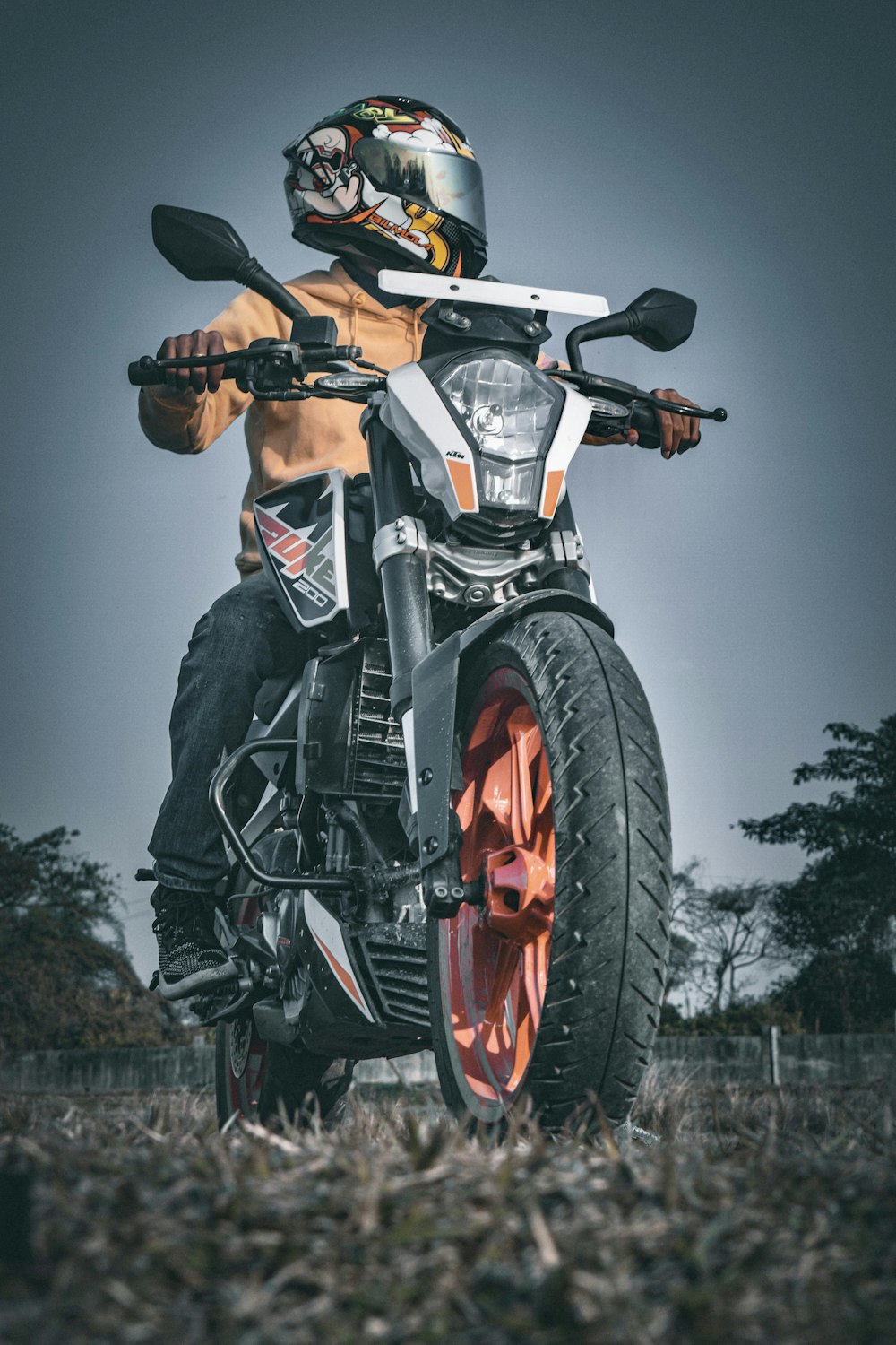 a man riding on the back of a motorcycle