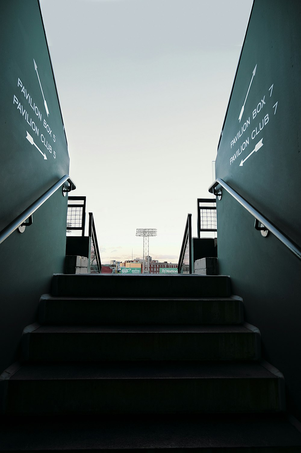 a set of stairs leading up to a stadium