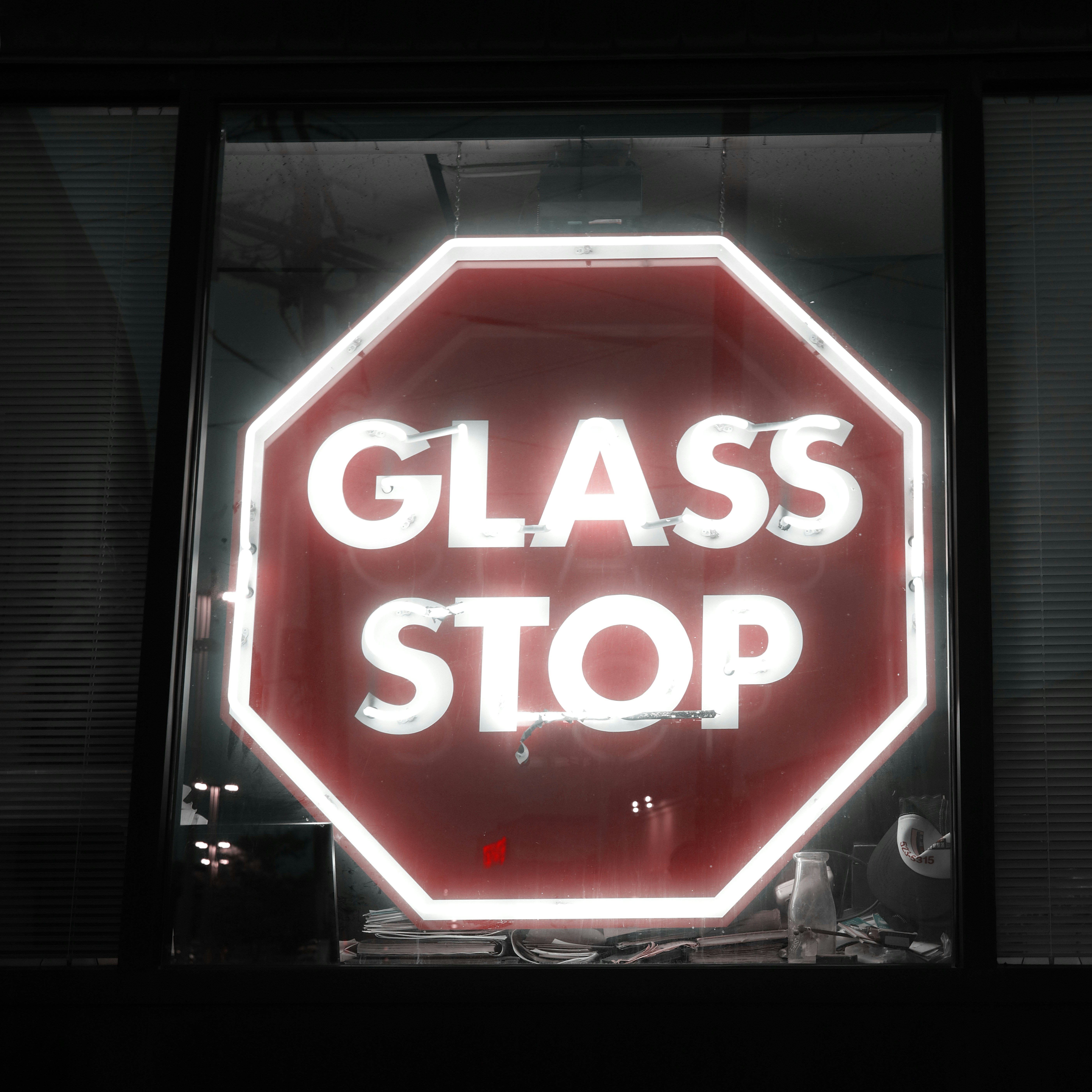 A red stop sign with the words glass stop on it photo – Free Boston ...