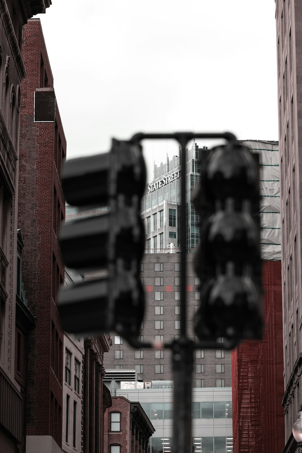 a street sign in the middle of a city