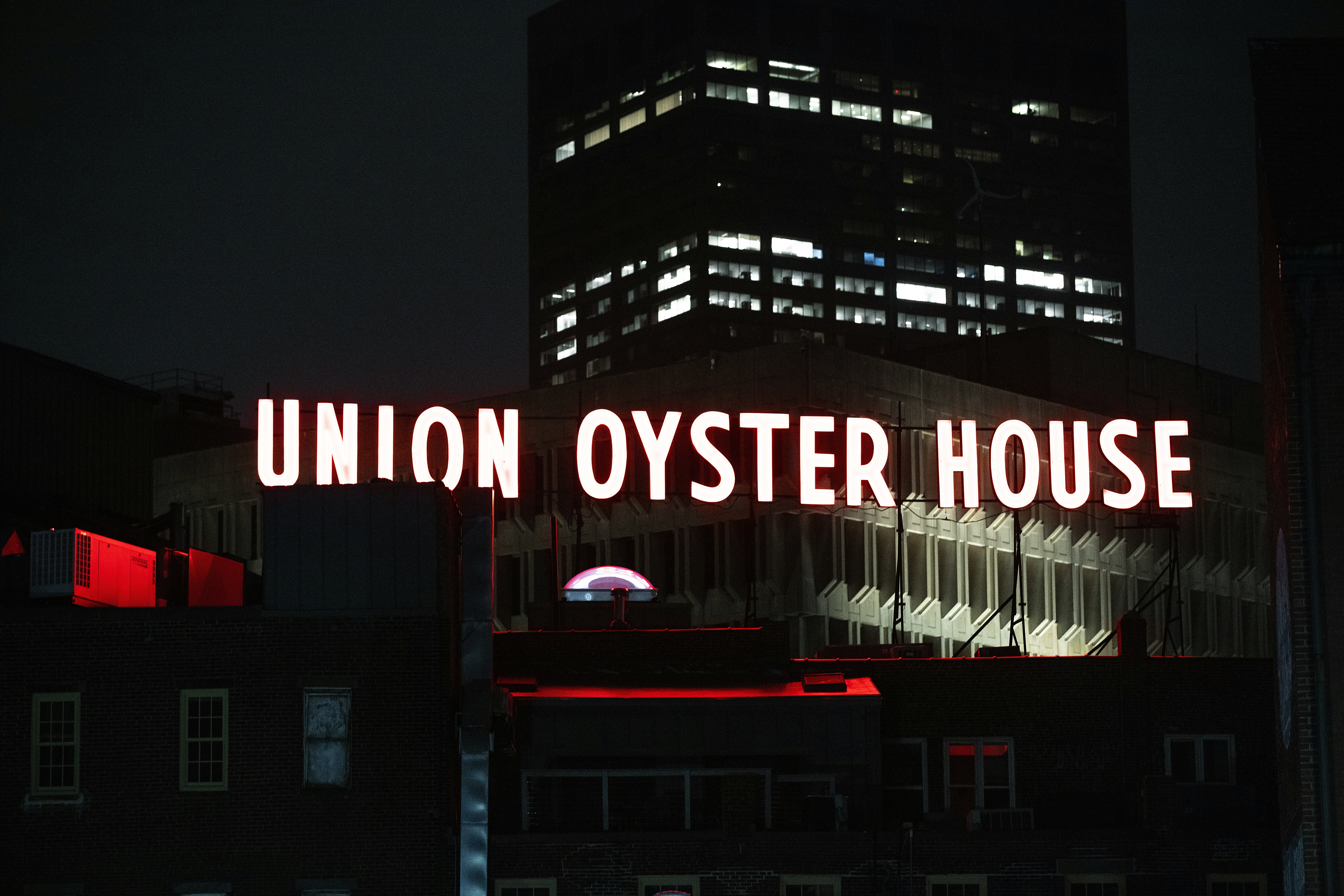 a neon sign that reads union oyster house