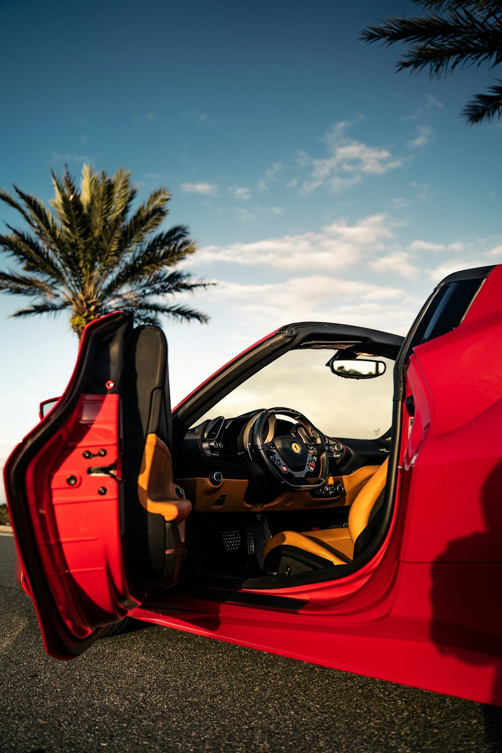 a red sports car with its door open