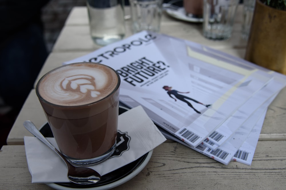 a cup of coffee sitting on top of a saucer