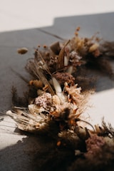 a bunch of dead flowers laying on the ground