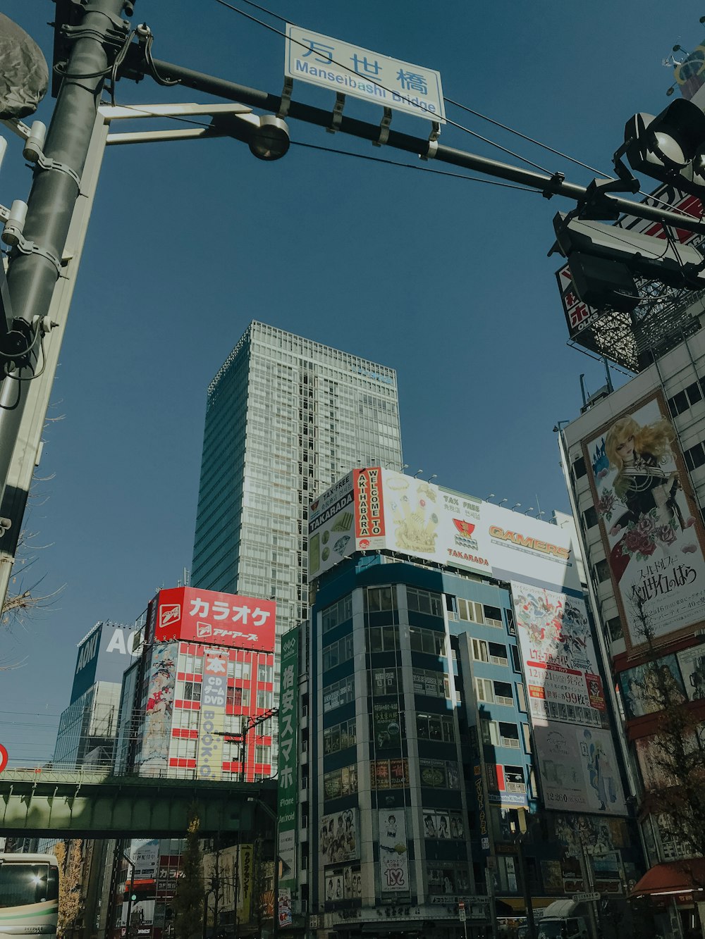 a city street filled with lots of tall buildings