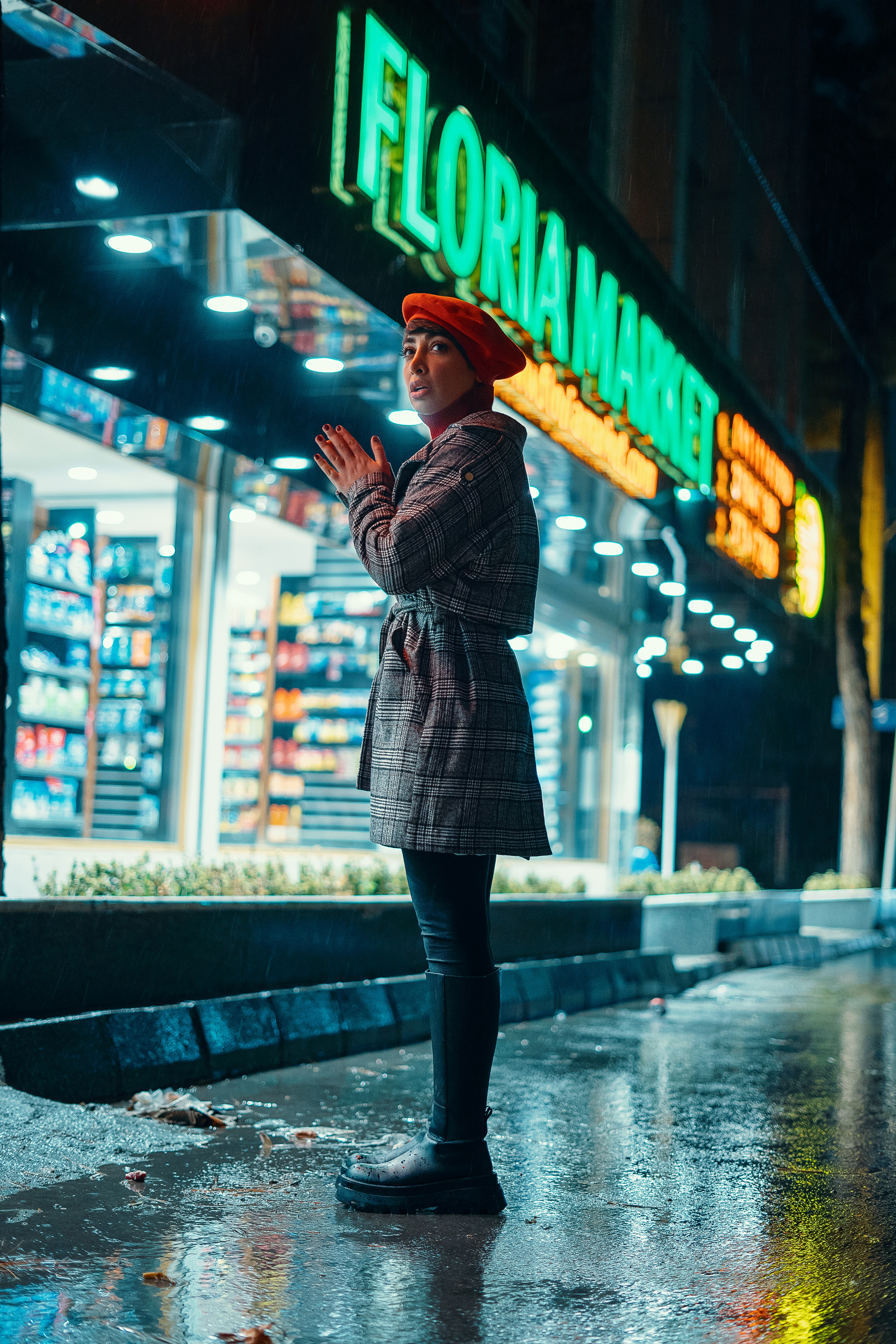 a person walking in the rain holding an umbrella