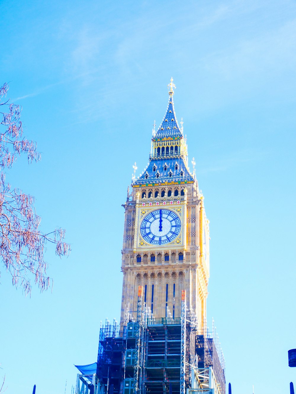 a large clock tower with scaffolding around it