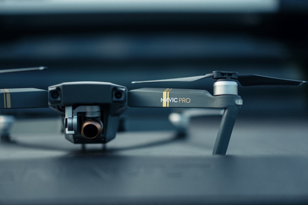 a close up of a black and silver dji - pro dji - pro