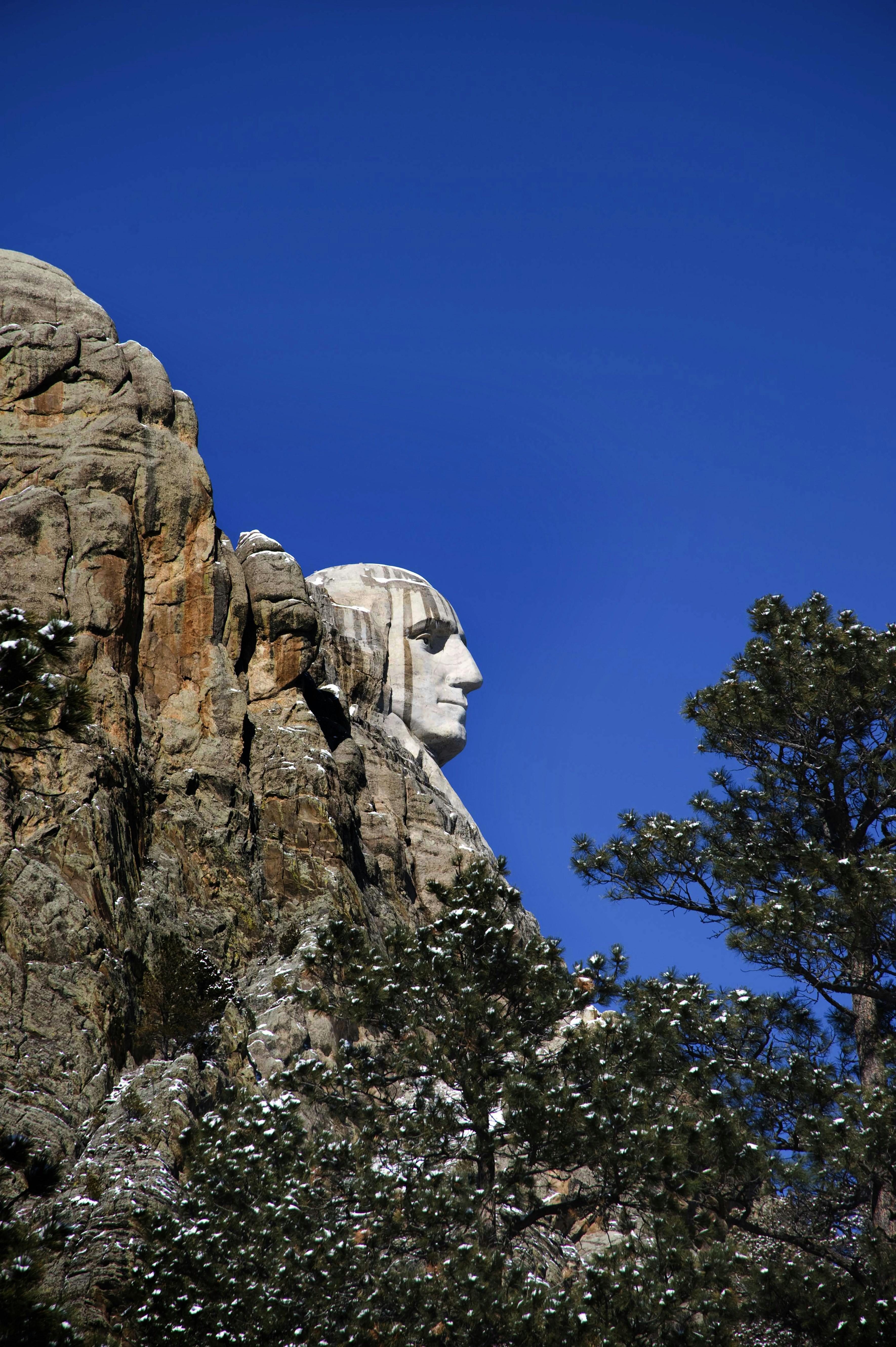 a statue of abraham on top of a mountain