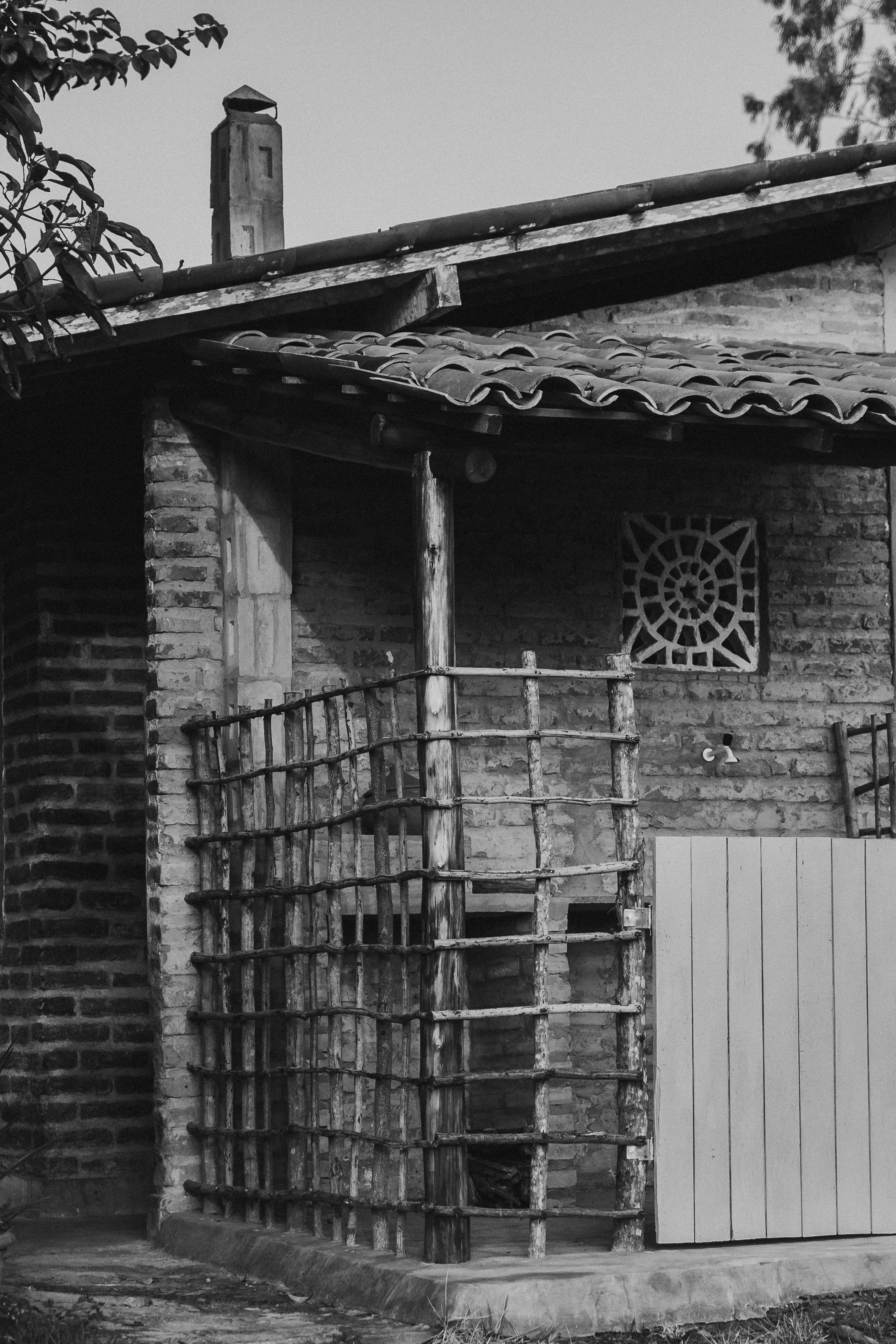 a black and white photo of a brick building
