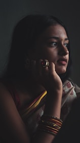 a woman is talking on a cell phone