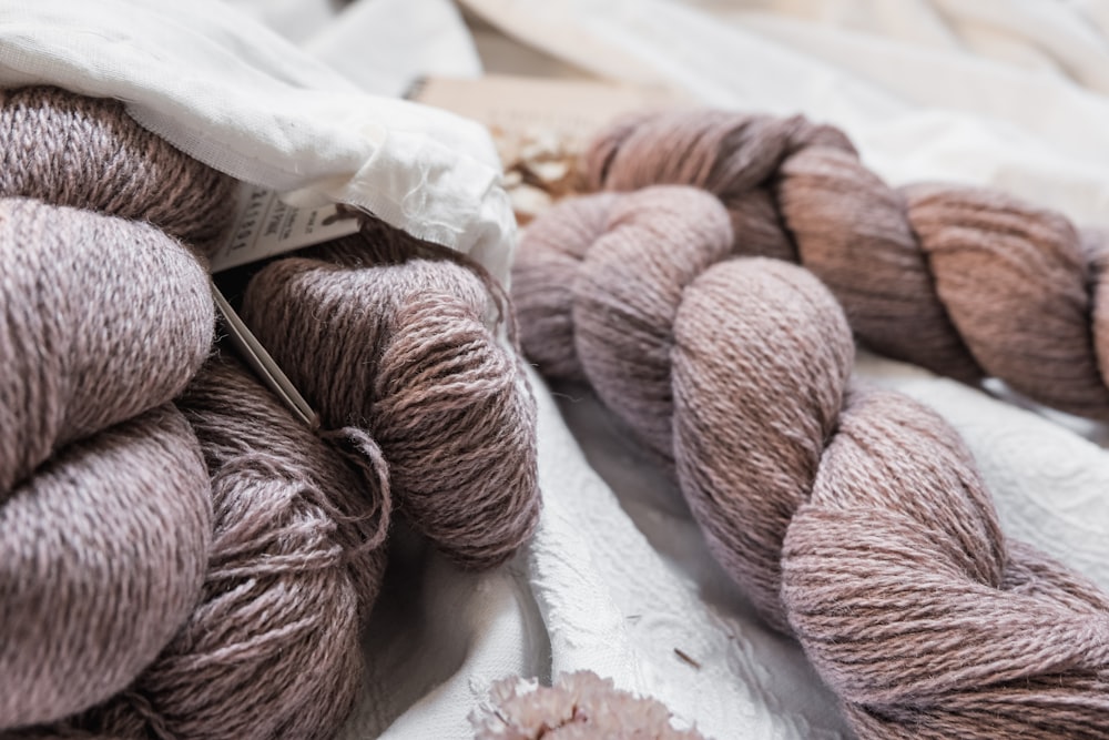 several skeins of yarn sitting on a table