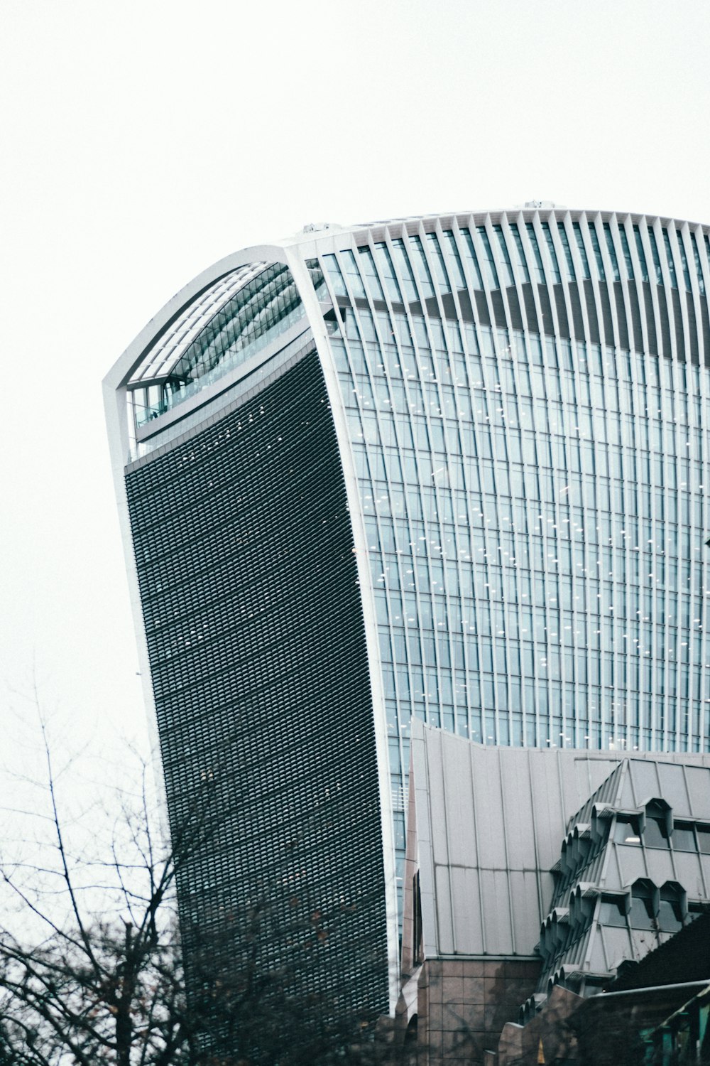 a very tall building with a very tall clock on it's side