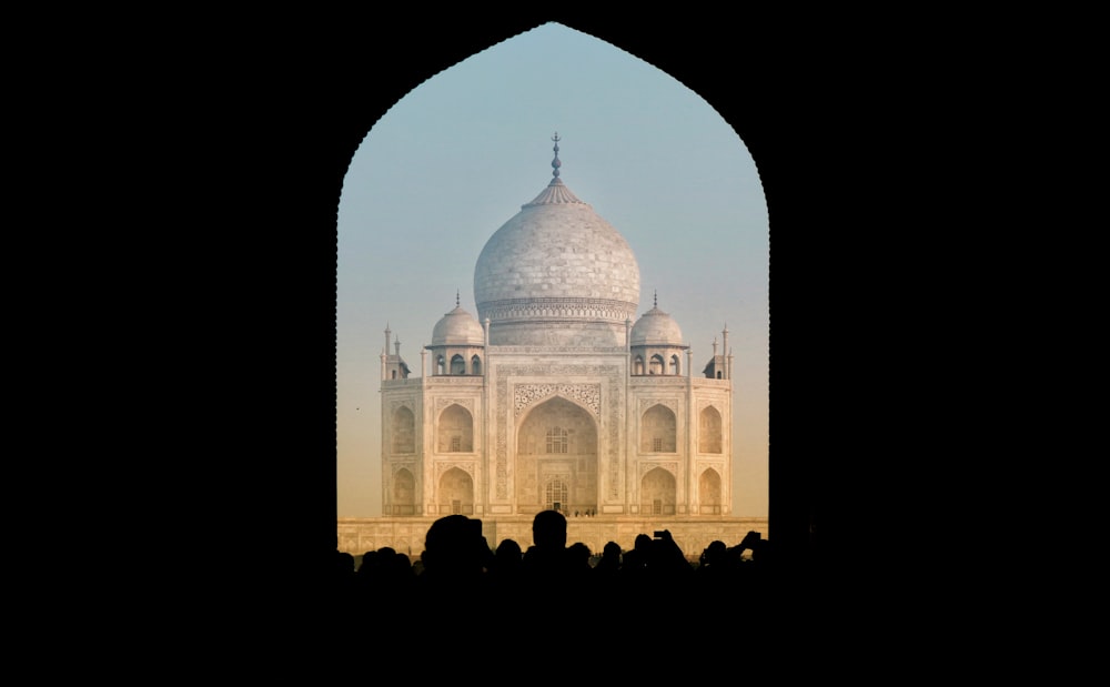 a large white building with a dome on top of it