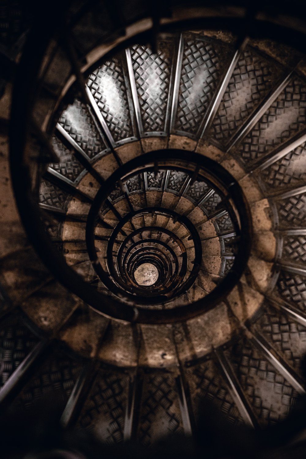 a spiral stair case in a building