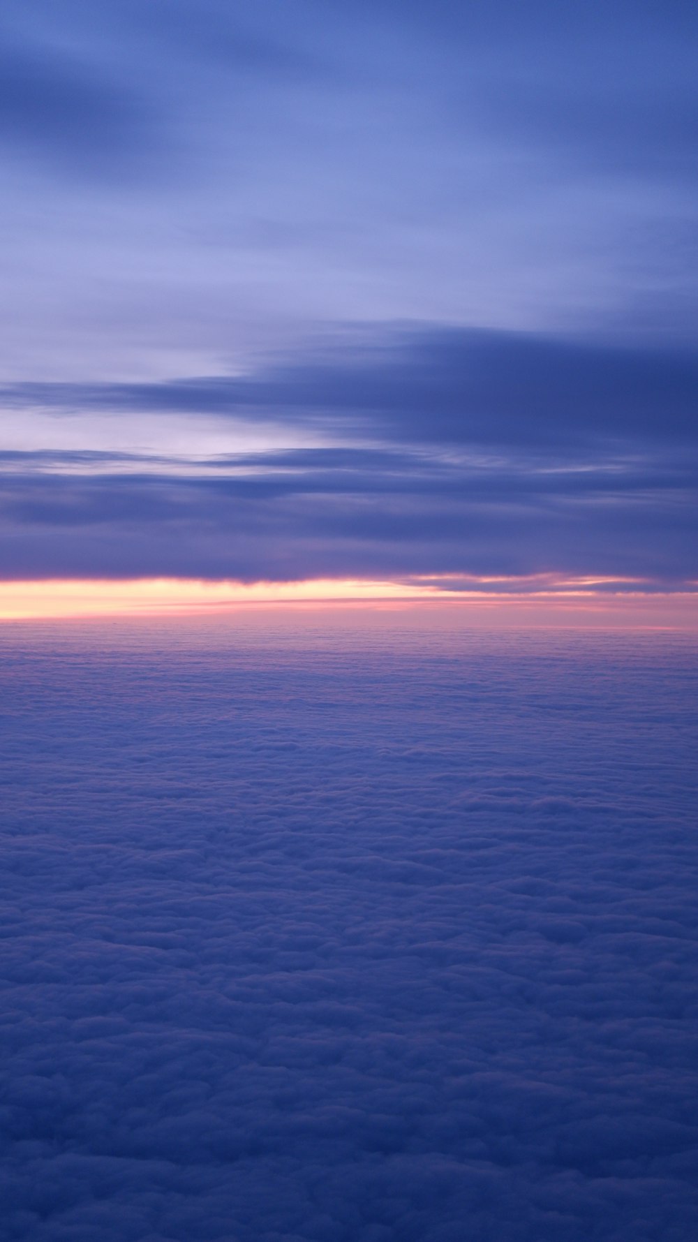 a view of the sky and clouds from an airplane