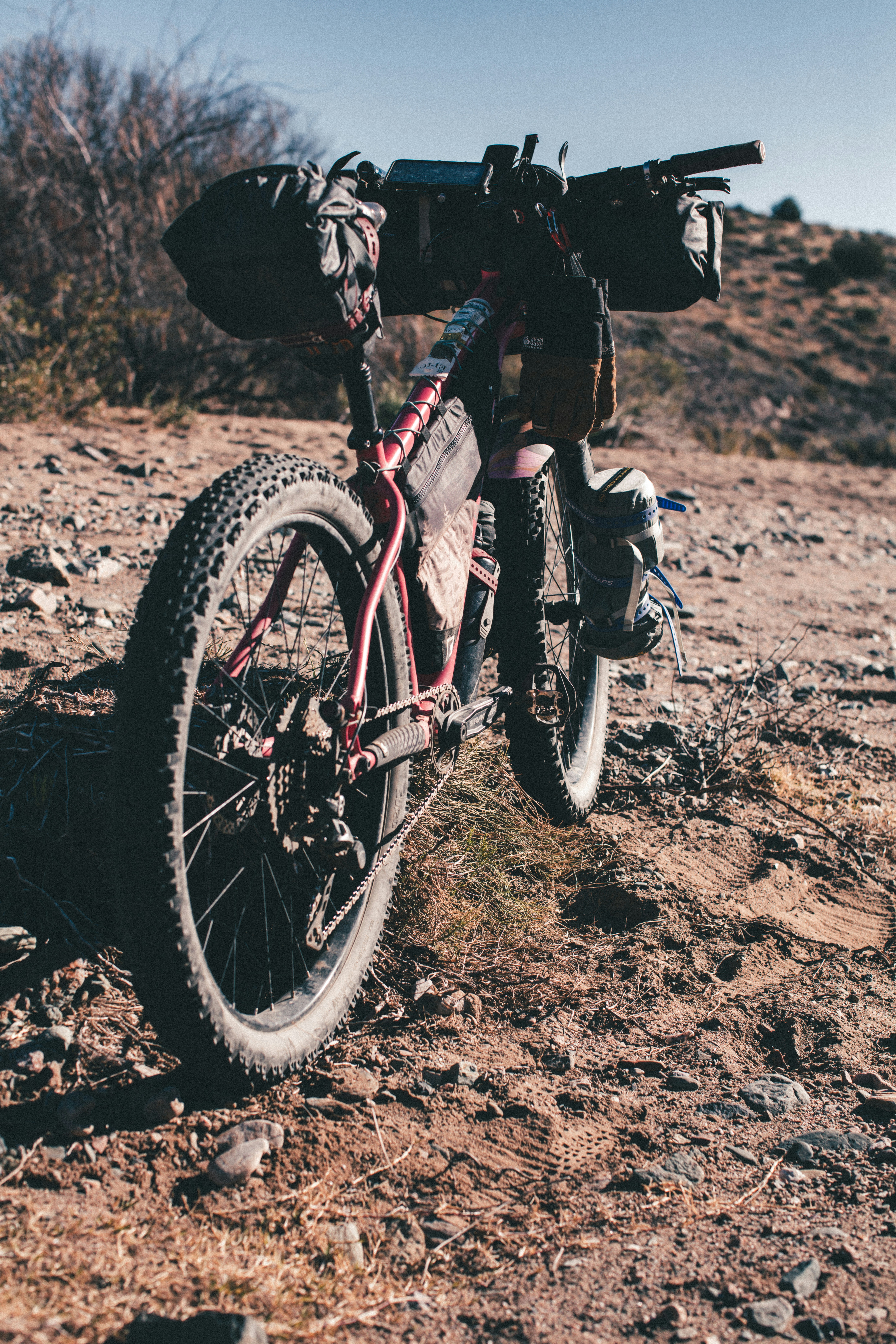 a bike with a bag on the back of it