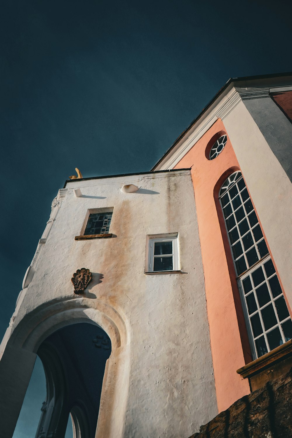 a tall building with a clock on the side of it