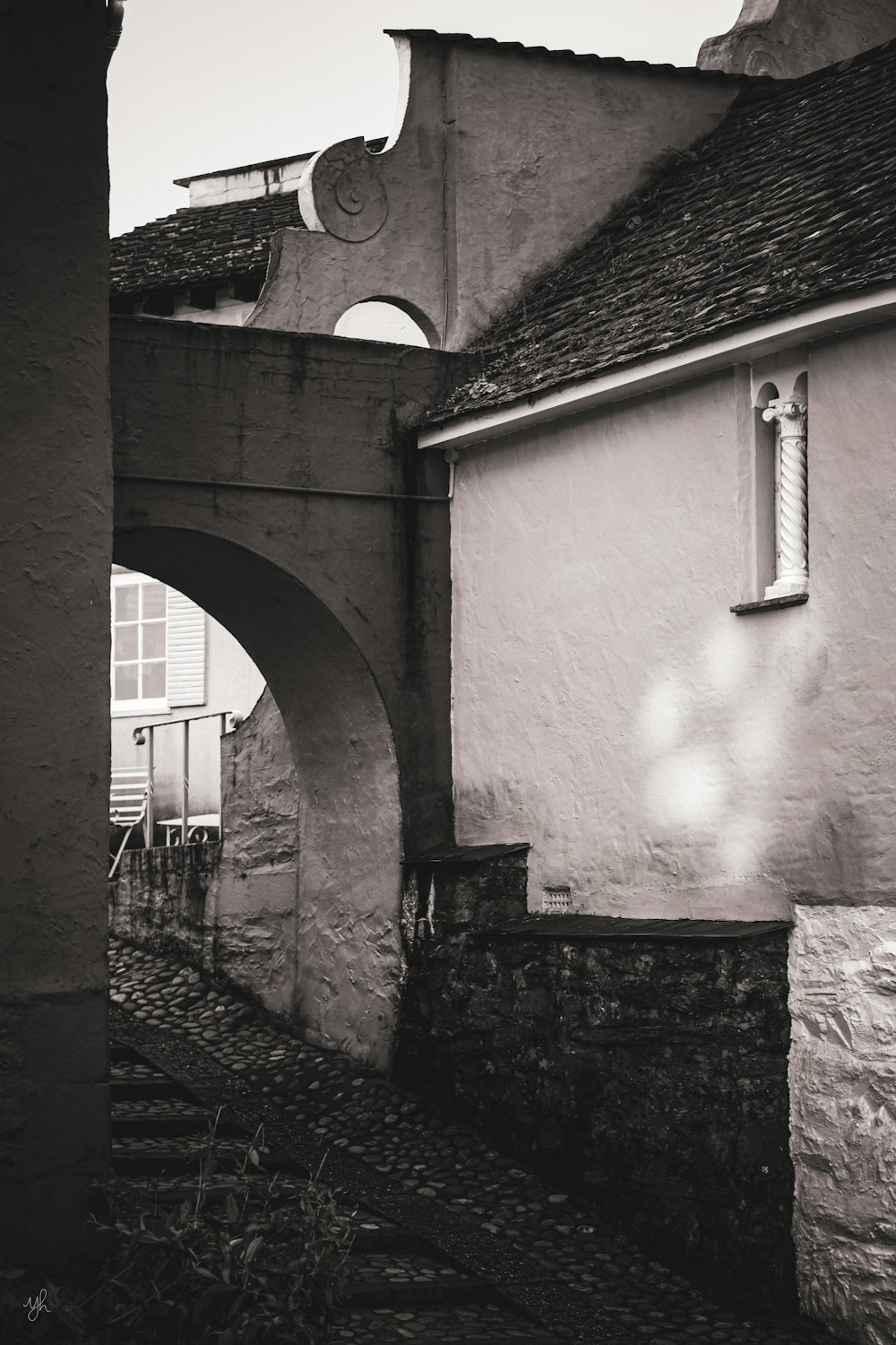 a black and white photo of an old building